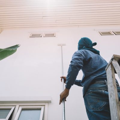 Man painting wall