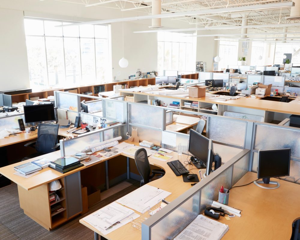 Partitioned computer workstations in an open plan office